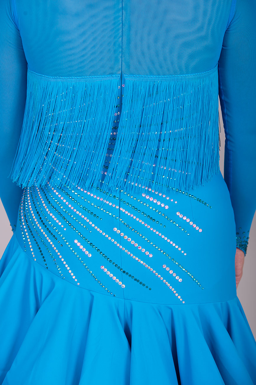 126L Gorgeous Blue Latin Competition Dance Dress. High Back allowing option to wear own Bra
Very flattering design to the tummy/hip with full deep frill skirts for maximum movement & fringes to the upper chest