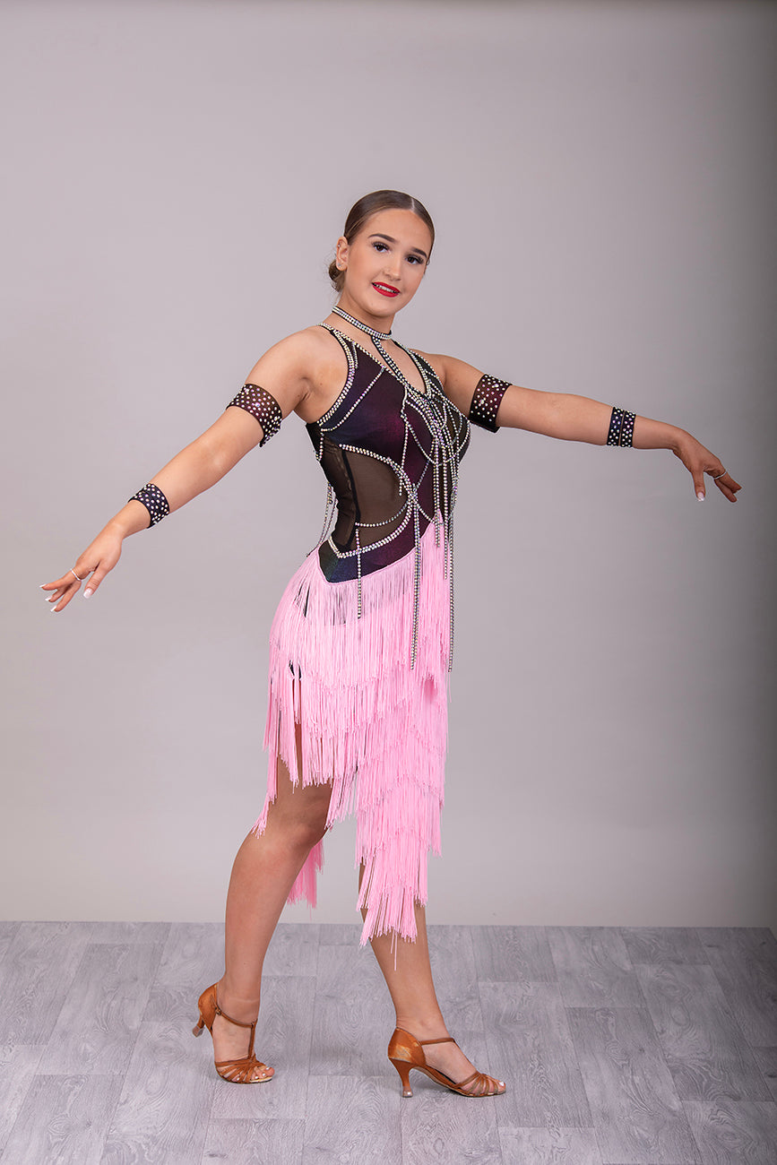 087 Black & Pink layered Fringe Latin Dress. Rainbow metallic bodice with stoned materials drapes & droppers. Backless dress with material droppers.