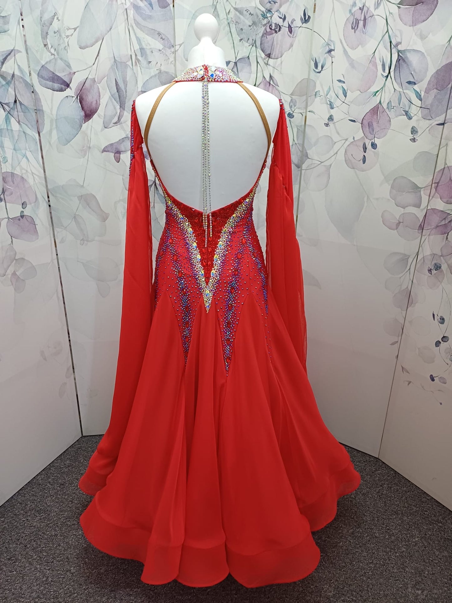 61B Bright Red Competition Ballroom/Sequence Dance Dress. Open detailing to the centre front, heavily stoned in Light Siam, AB & Siam AB. Beautiful Key hoke detail at neck. ❤️Showroom Appointments Available❤️
