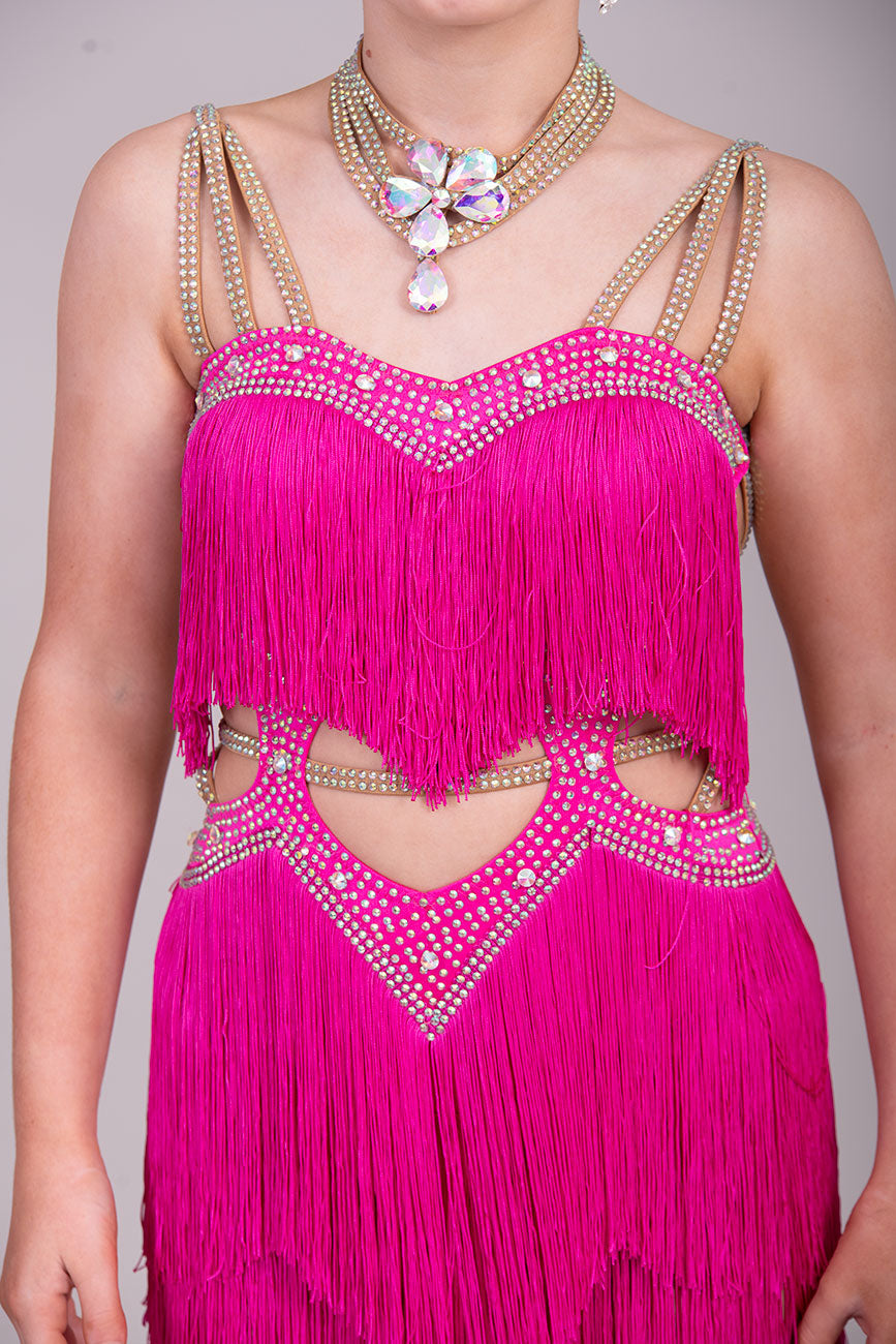 (BUDGET)15Cerise Latin Competition Dance Dress.Full Fringed Skirts with shoulder & waist detailing. 2 Bangles included.                                     *****Our New Budget Range are Bought in ready made Costumes, with some detail added by TWDance*****