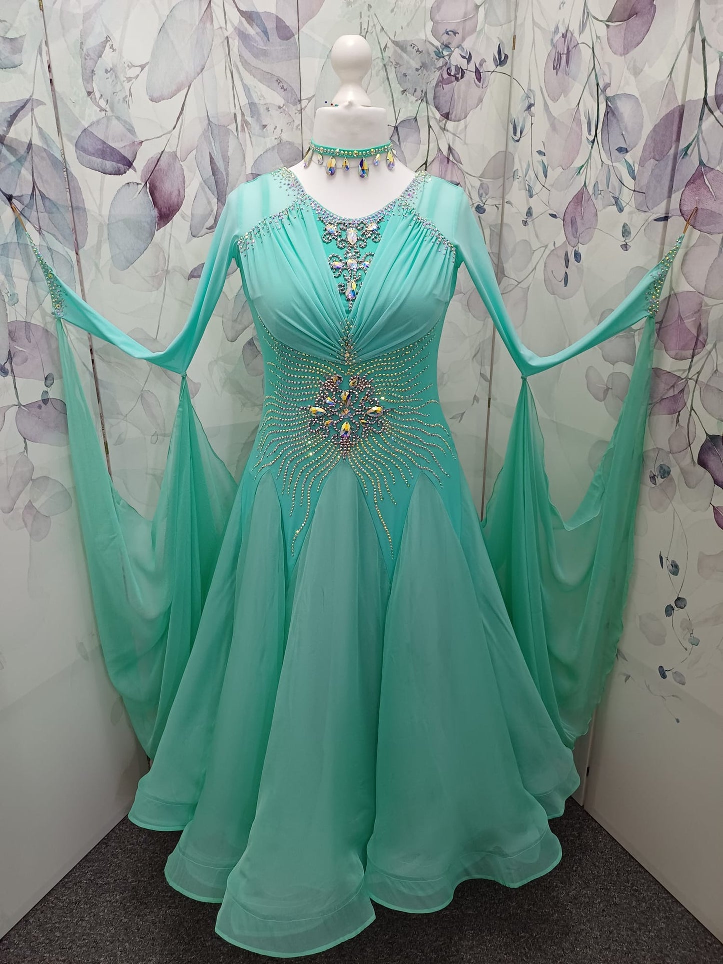 73B Pretty Mint Green Competition Ballroom Dance Dress. Stoned in AB with mesh overlay to the upper chest. Detachable Floats. ❤️Showroom Appointments Available❤️