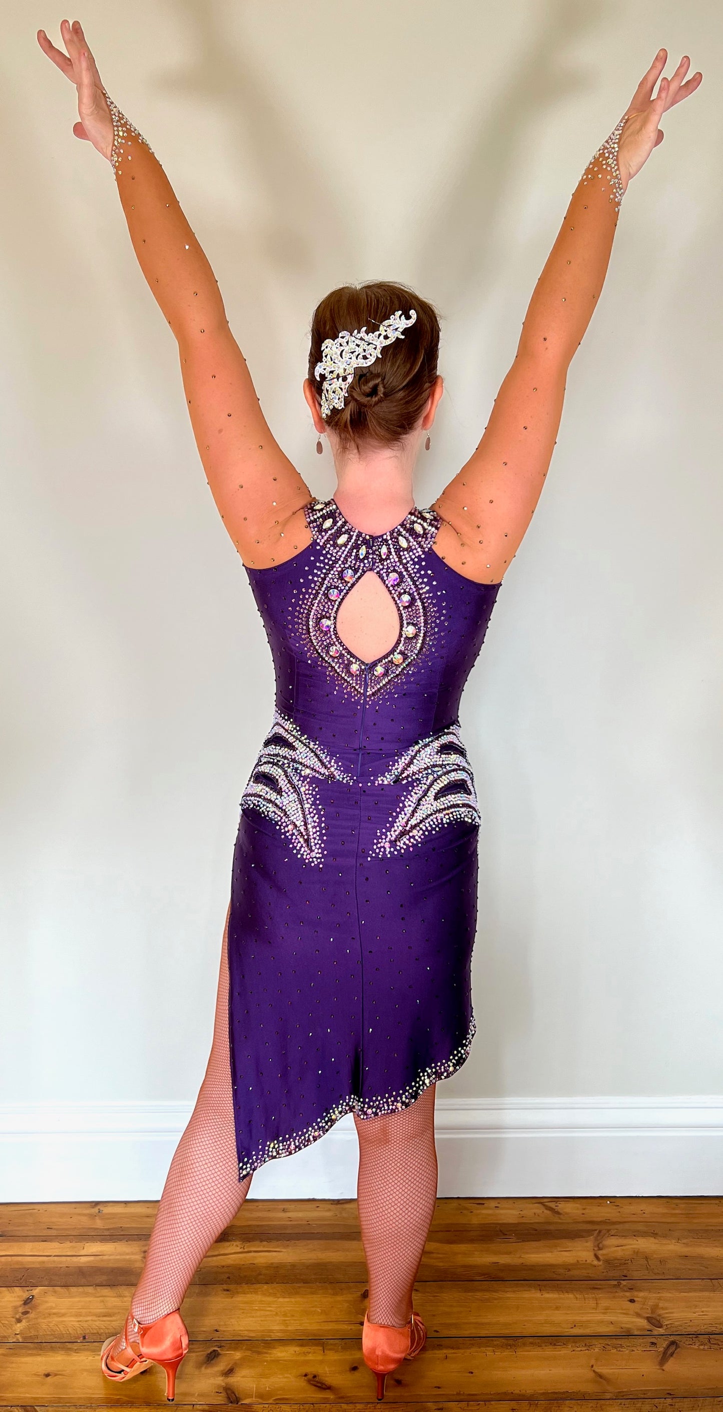 0002 Deep Purple Latin Dress. Heavily stoned in Amethyst, Light Amethyst & AB. Keyhole feature to the back, touching detail at the front.