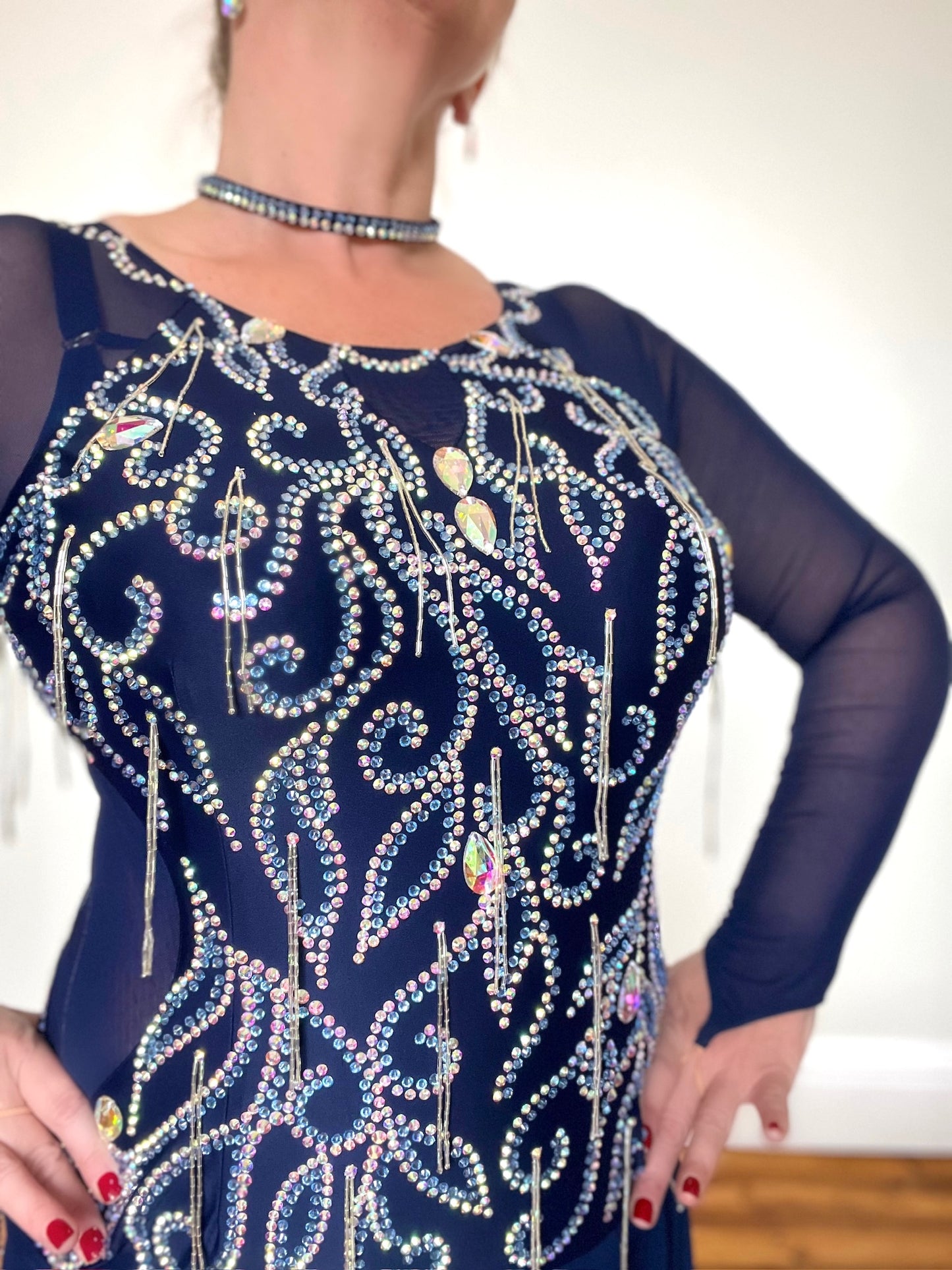 0014 Midnight Blue Competition Latin Dress. Heavily stoned in Sapphire, Light Sapphire, Sapphire AB & AB. High back with Mesh Sleeves