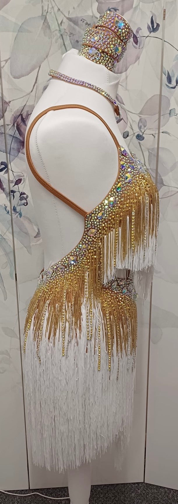 002 White & Gold full fringed Competition Latin Dance Dress. Heavily stoned with Gold & AB. Comes with Armbands & Bracelets. Very full fringes with stoned fabric strips added.