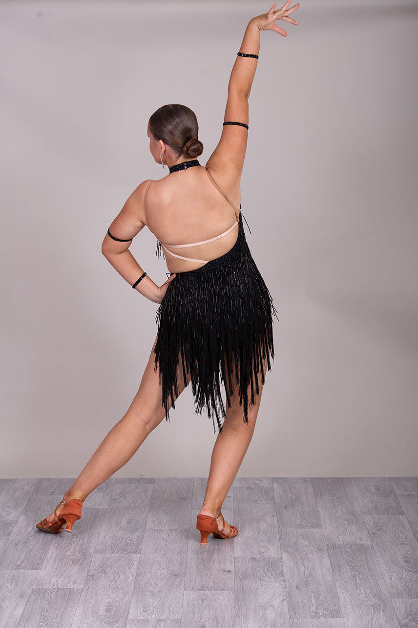 133L BUDGET (23) Black  Competition Latin Dance Dress. Beading detail to upper chest. Bead droppers with fringed skirt  Stoned in jet ❤️Showroom Appointments Available❤️