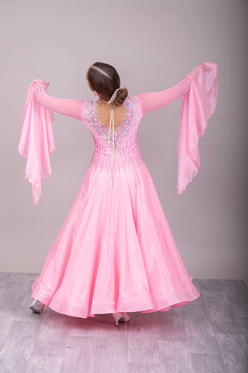 01B Ballroom/Sequence Competition Dance Dress. Sugar Pink Pearl Chiffon stoned in AB & Light Rose. Comes with Pearl Necklace. Filled in mesh back for modesty.