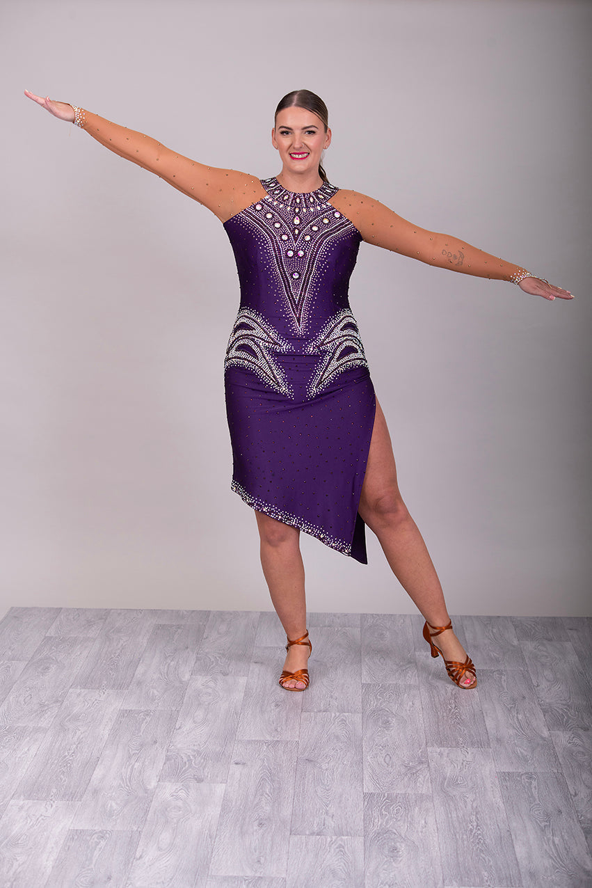 0002 Deep Purple Latin Dress. Heavily stoned in Amethyst, Light Amethyst & AB. Keyhole feature to the back, touching detail at the front.