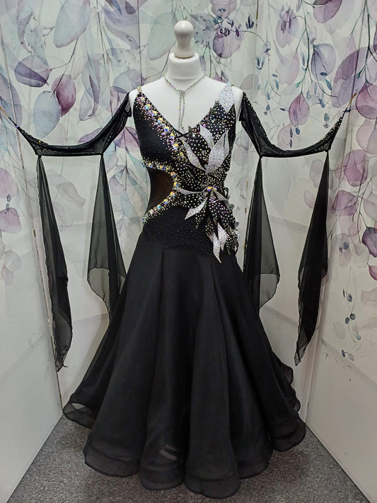 58B Gorgeous Black Ballroom/Sequence Competition Dance Dress. 3D Design to right side of bodice. Heavily stoned in jet & AB. ❤️Showroom Appointments Available ❤️