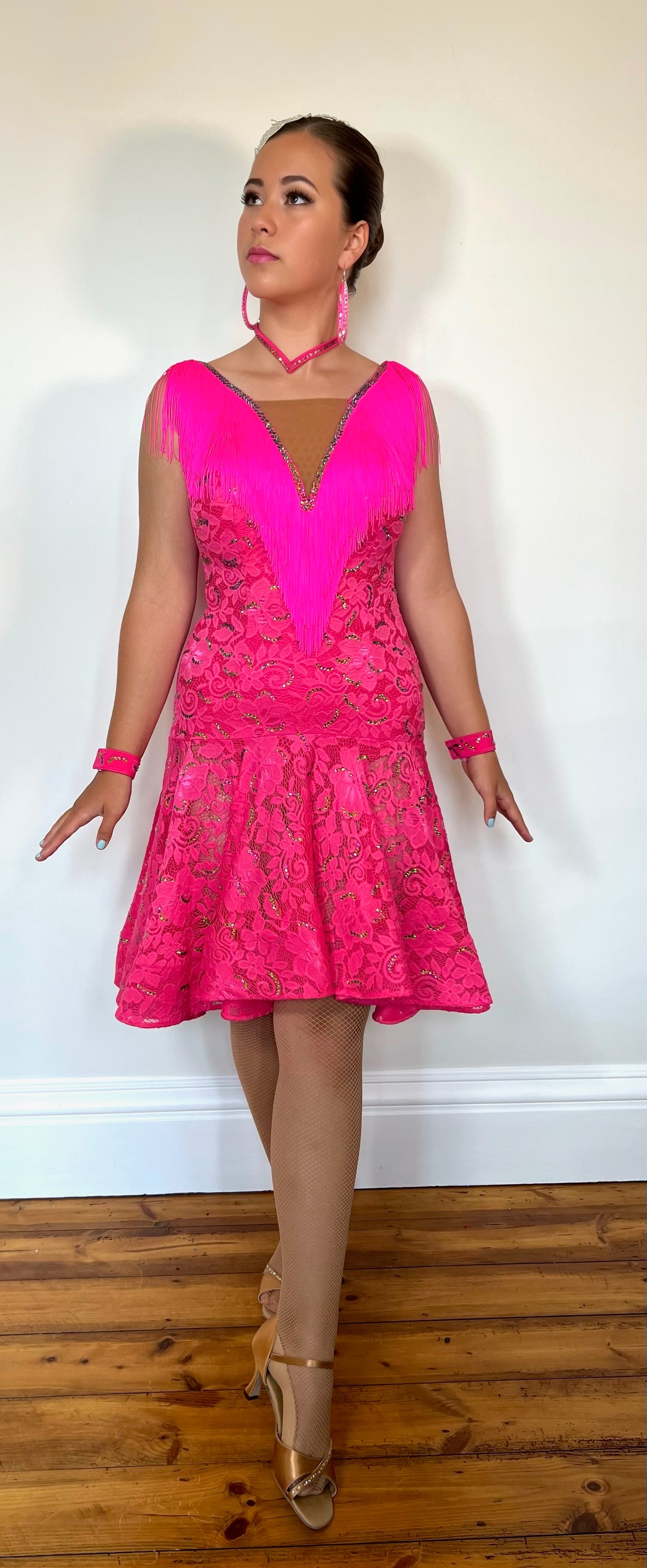 020 Cerise Pink Lace Dress with fringe detail to chest and back.