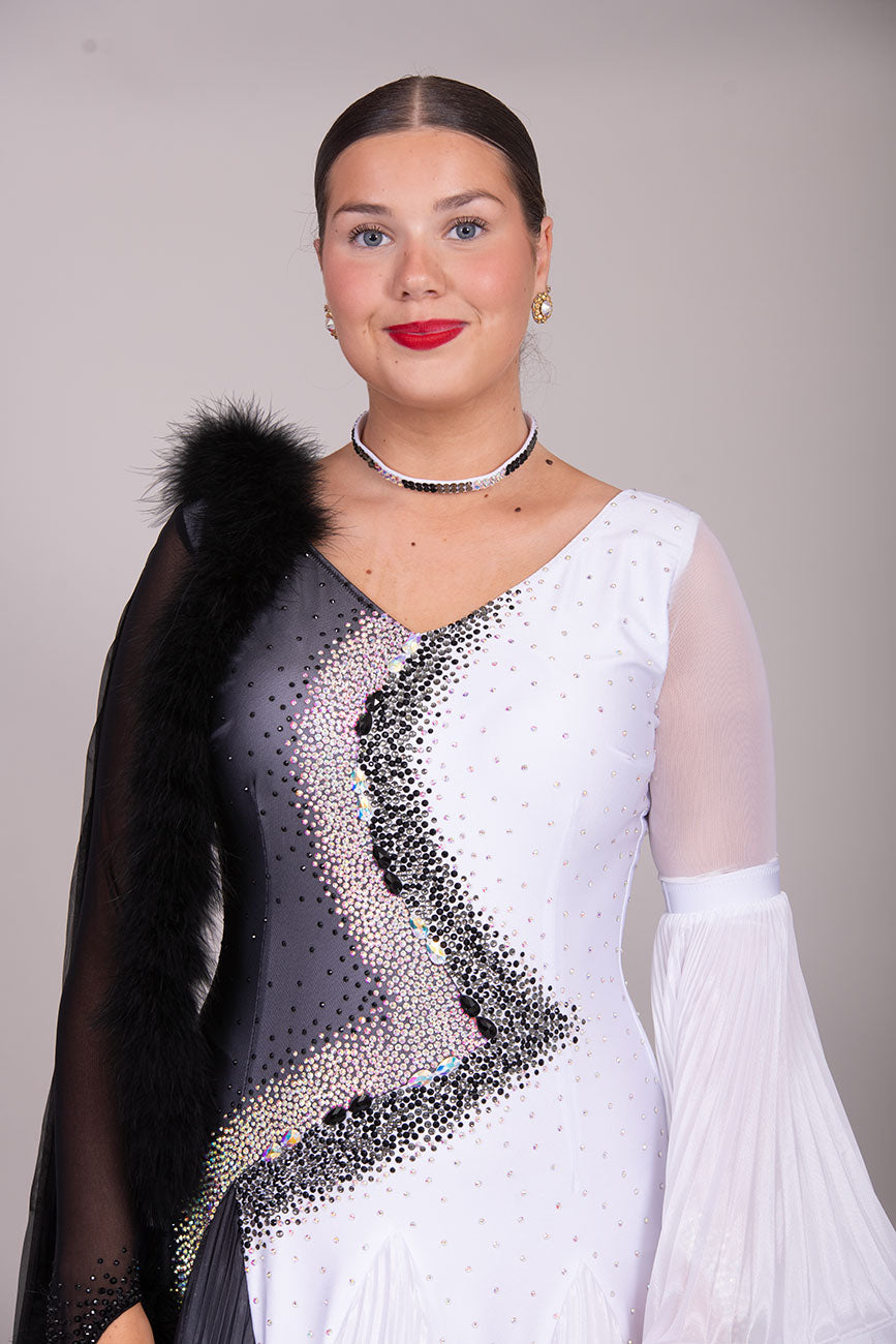 33B  “TWD ELITE” Ballroom/Sequence Competition Dance Dress
High Back allowing option to wear own Bra. Pleated Skirts in Black & White Ombre Pearl Chiffon. Pleated bell sleeve to 1 arm. Finger loop can be added. 

❤️Showroom Appointment Available❤️