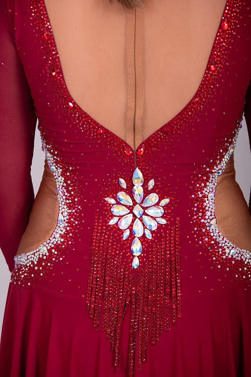 052 Wine Colour Latin Competition Dance Dress with heavily stoned stunning design in AB & Dark Siam High Mesh Back to give option of wearing own Bra. Flesh colour Lycra side panels (not see through) giving the illusion of cut outs.