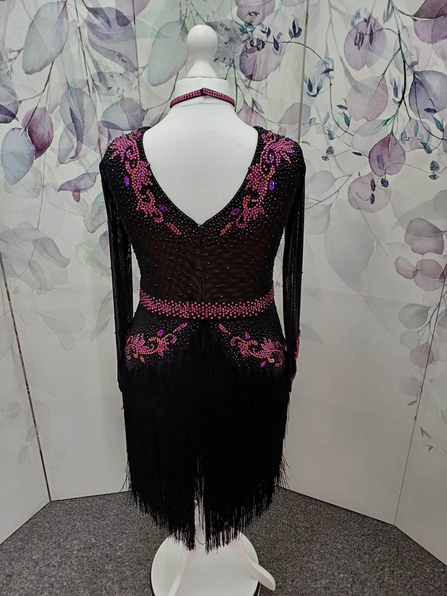27L Black Latin Competition Dance Dress. Fuchsia Appliqué stoned in Fuchsia, Rose & Black. Optional Belt. High back giving option to wear own bra. Full fringed skirts.