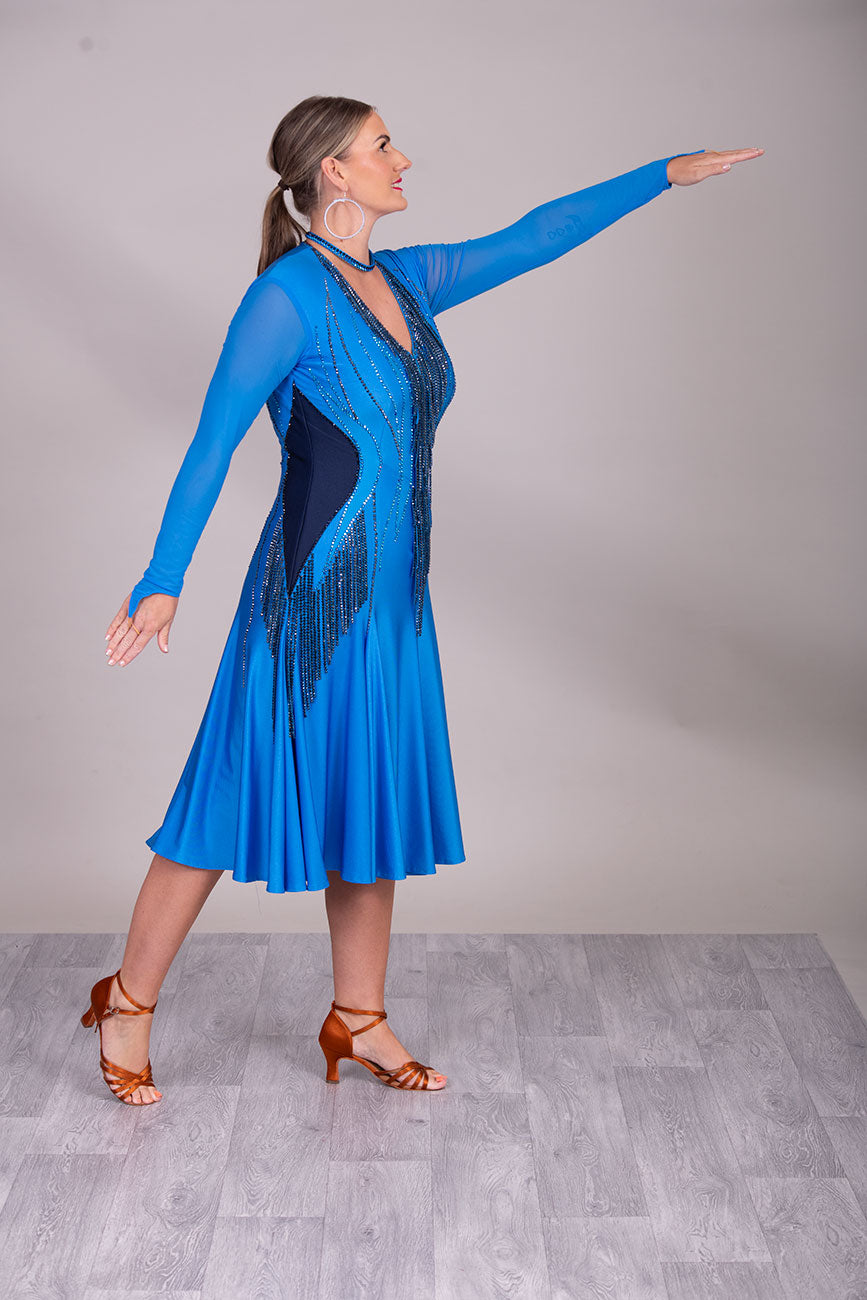 120L Light Royal Blue Competition Latin Dance Dress. Bead dropper detail to the front & Back with full back giving option to wear own Bra. Super Full Skirt for Maximum movement.