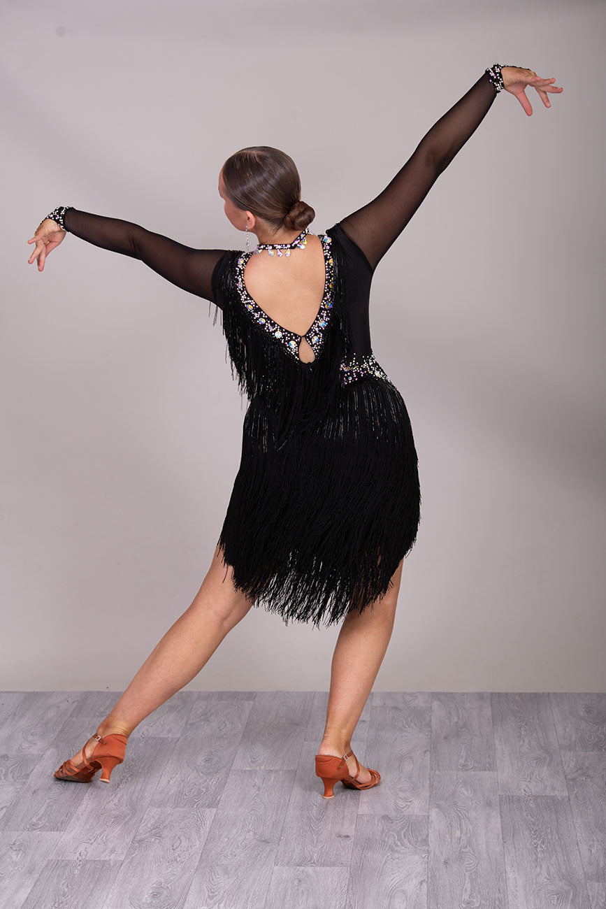 124L Latin Competition Dance Dress
High Back with option of wearing own Bra. Very full fringe to the chest & skirt. Stoned in jet & AB