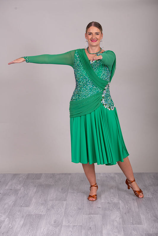 115L Emerald Green Competition Latin Dance Dress. Stunning dense stoning in AB, Emerald & Emerald AB. Sash details to the chest & Hip. High Back to give option of wearing own bra