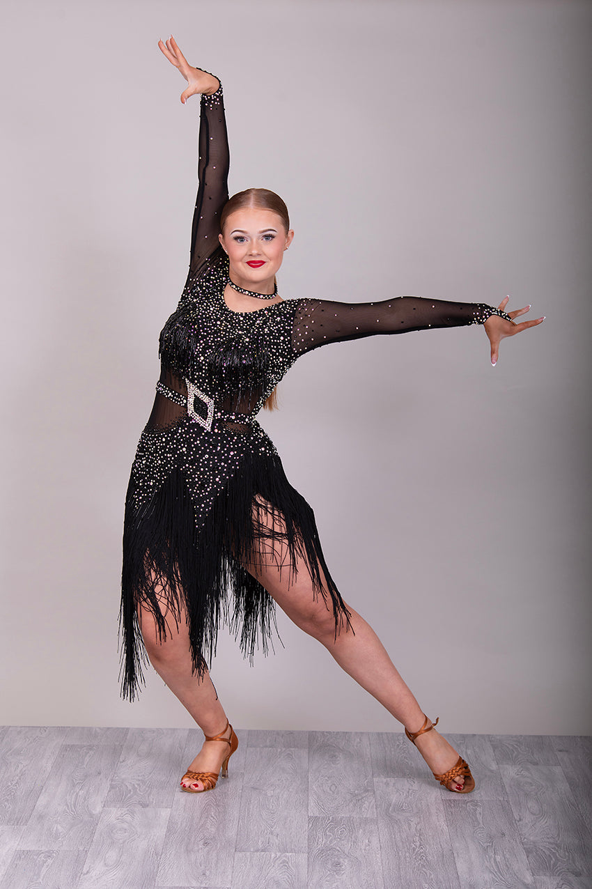 19L Black Latin/Rhythm Competition Dance Dress. Heavily stoned in black & AB with optional Belt. Bead droppers to the chest area and fringe shaped skirt