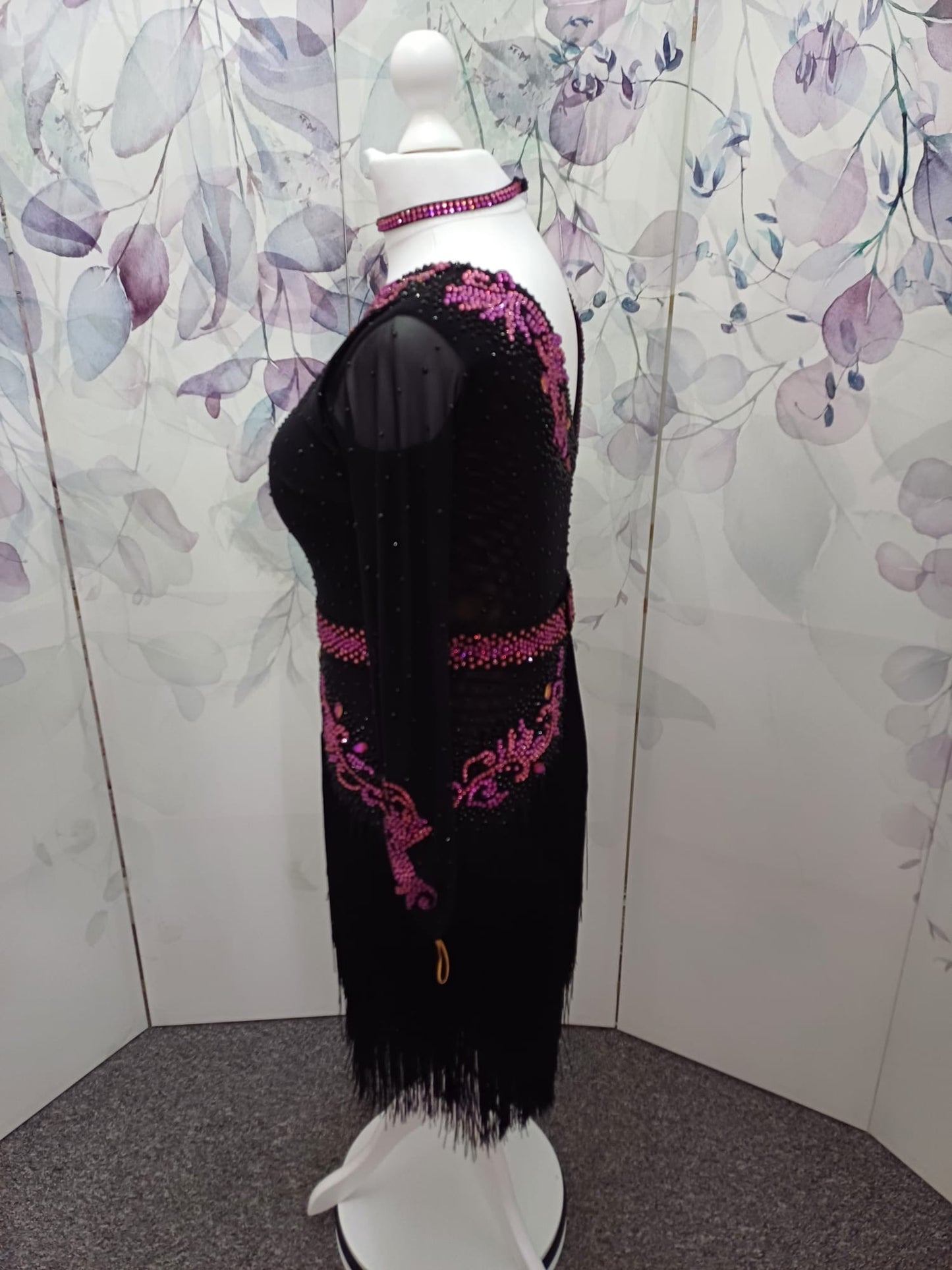 27L Black Latin Competition Dance Dress. Fuchsia Appliqué stoned in Fuchsia, Rose & Black. Optional Belt. High back giving option to wear own bra. Full fringed skirts.