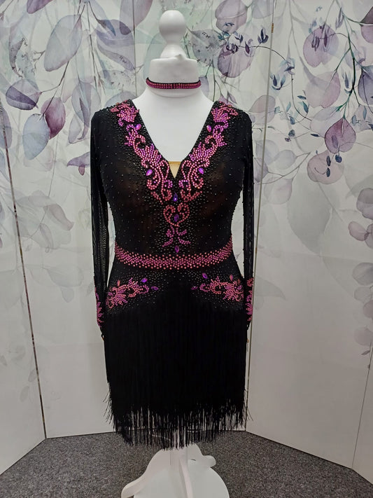 27L Black Latin Competition Dance Dress. Fuchsia Appliqué stoned in Fuchsia, Rose & Black. Optional Belt. High back giving option to wear own bra. Full fringed skirts.
