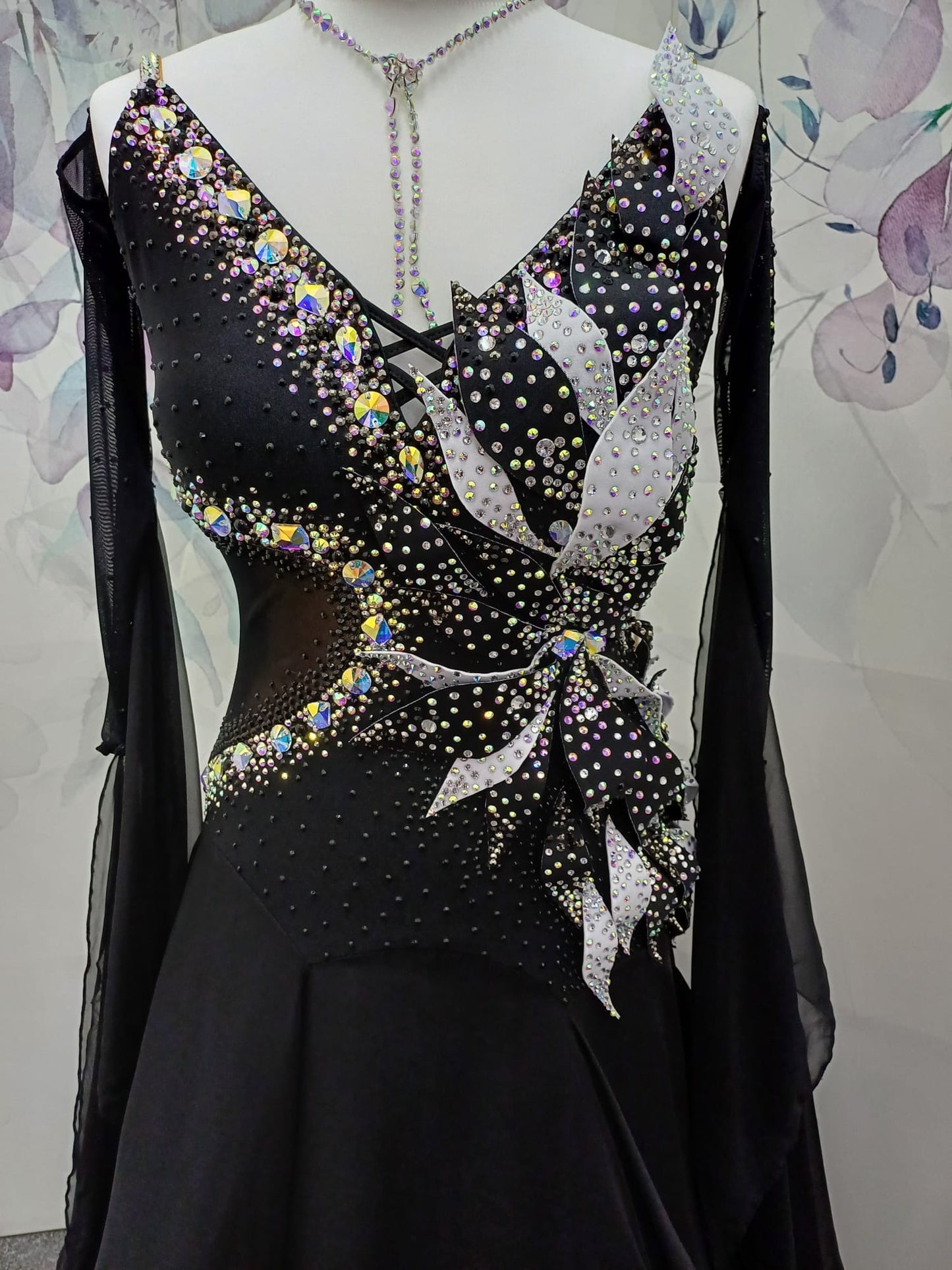 58B Gorgeous Black Ballroom/Sequence Competition Dance Dress. 3D Design to right side of bodice. Heavily stoned in jet & AB. ❤️Showroom Appointments Available ❤️