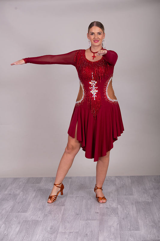 052 Wine Colour Latin Competition Dance Dress with heavily stoned stunning design in AB & Dark Siam High Mesh Back to give option of wearing own Bra. Flesh colour Lycra side panels (not see through) giving the illusion of cut outs.