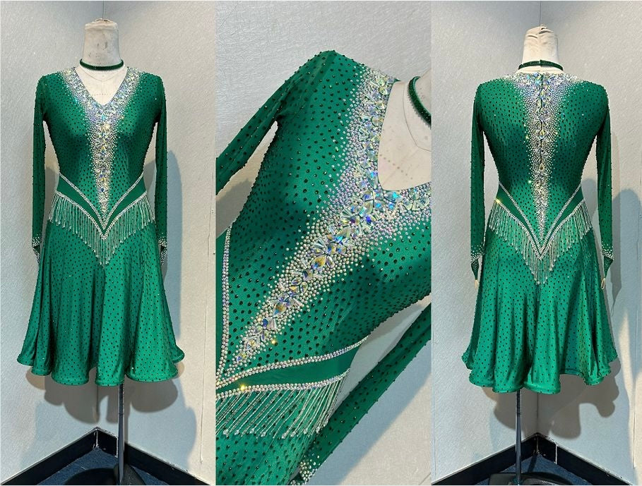 113L Jade Green Competition Latin Dance Dress. Super Full skirts. Heavily stoned in a very flattering design in AB & Emerald with Bead droppers.  High Back to give option of wearing own bra