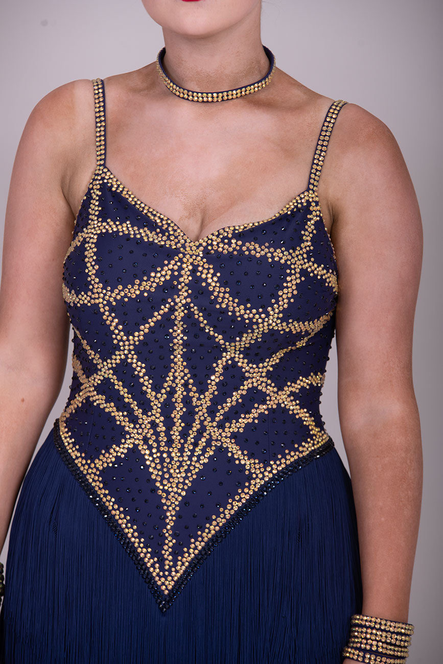 38L Navy Blue & Gold Competition Latin Dance Dress. Very full fringed skirts with full bodice details stoned in Gold