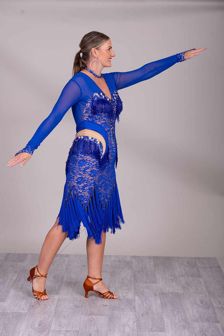 128L TWD “ELITE” Stunning Royal Blue Competition Latin Dance Dress. Striking stone detail with lace over mesh Lycra. Front Zip fastening for ease. High back mesh on Lycra giving option of wearing own bra. ❤️Showroom Appointments Available❤️