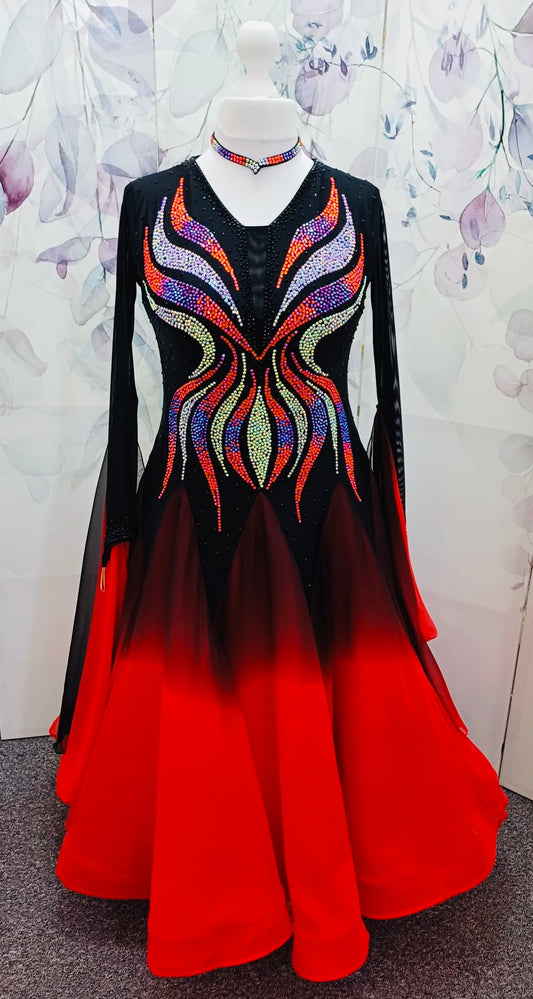 39B Red Black & Orange Ombre Competition Ballroom/Sequence Dance Dress. Ombre stoning in Oranges through to AB. Black & Red Ombre skirts with full back coverage. Detachable Floats complete this beautiful dress