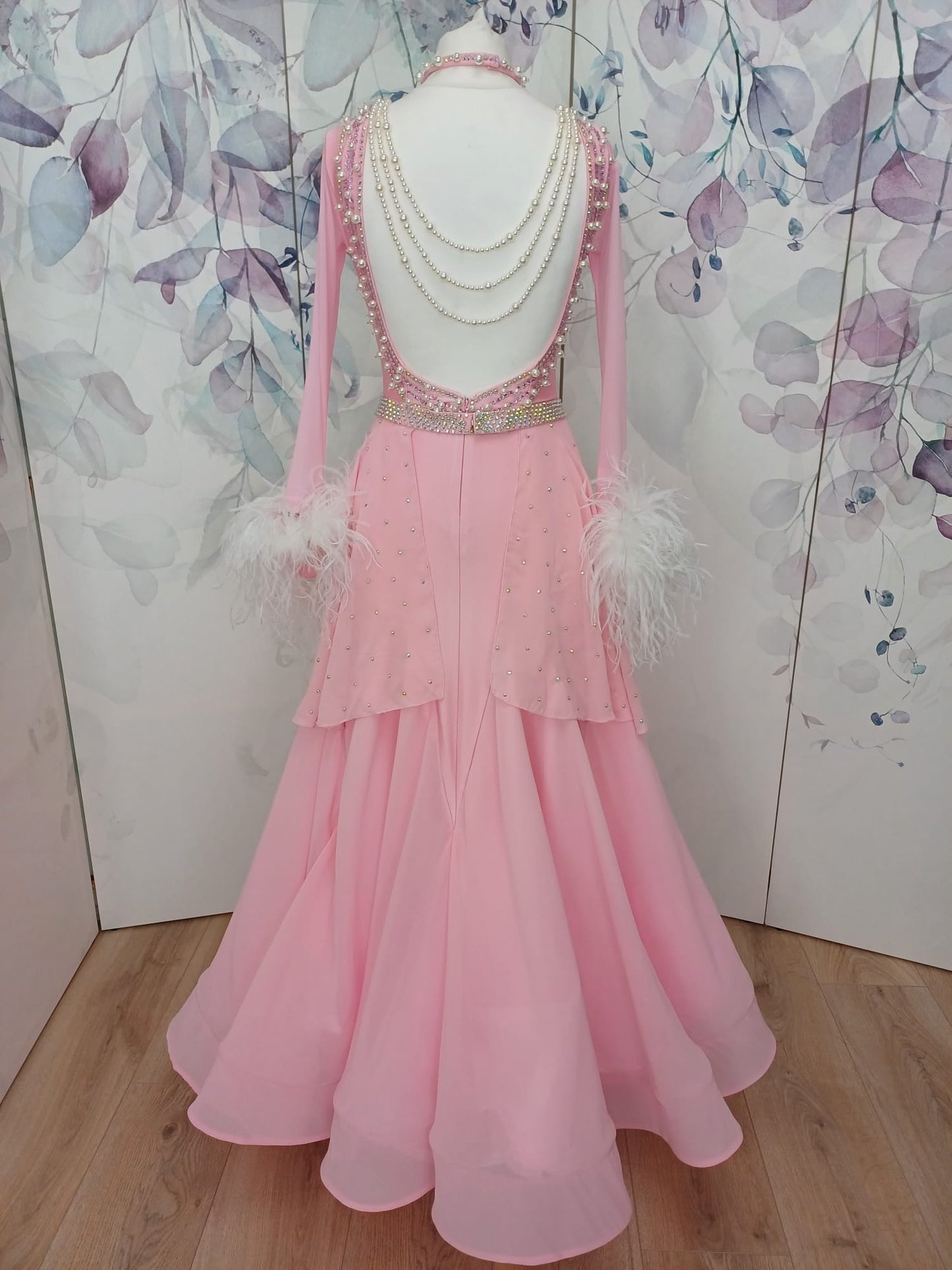 226 Pale Pink Ballroom/Smooth Dress. Decorated with Light Amethyst stones & pearls. Ostrich feather cuffs and drape decoration to the waist area front & back