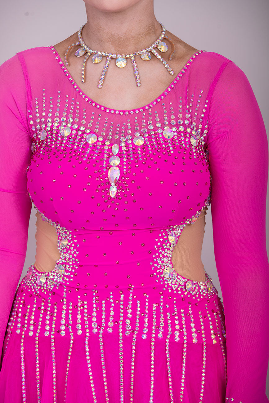 00002 Fuchsia Pink flesh side panel Ballroom Dress. AB stoned material droppers from the waist stoned with Ab throughout