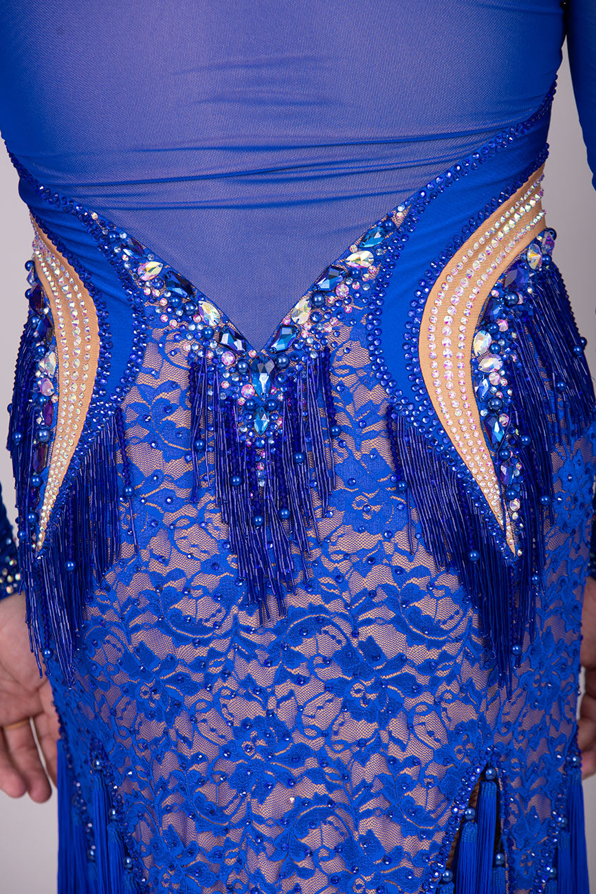 128L TWD “ELITE” Stunning Royal Blue Competition Latin Dance Dress. Striking stone detail with lace over mesh Lycra. Front Zip fastening for ease. High back mesh on Lycra giving option of wearing own bra. ❤️Showroom Appointments Available❤️