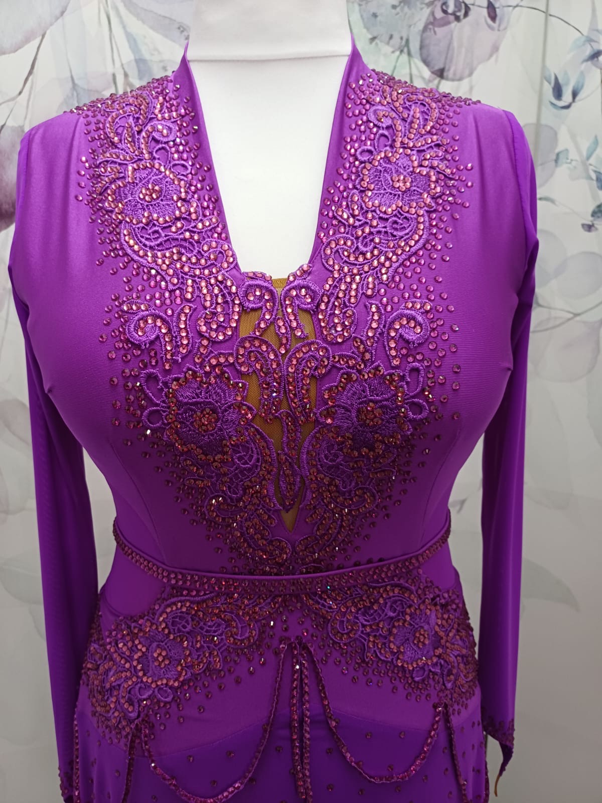 59L Hot Magenta Competition Latin Dance Dress.small split to front left. Very full skirt for maximum movement. High back to allow own bra option. Stunning stoned appliqués Strappy design waist/hip. Stoned in Fuschia & light Rose ❤️Showroom Appointments❤️