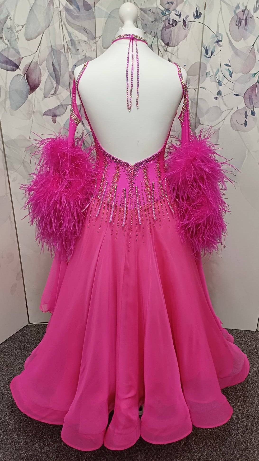 006 Cerise Pink Competition Ballroom/Sequence Dance dress. Comes with Gloves, Floats & Ostrich feathers. Stoned in AB, Rose & Rose AB. 3D detail to the waste.