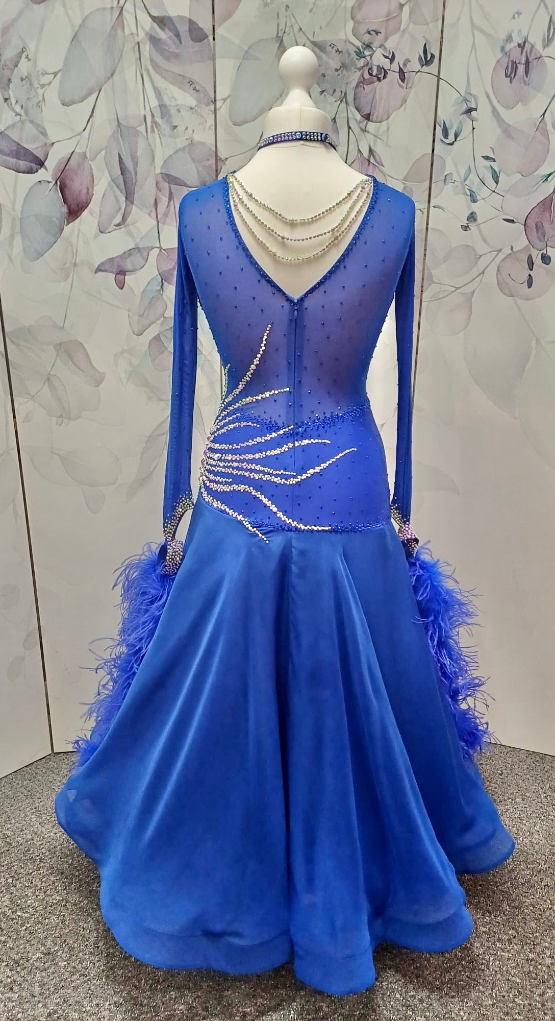 098 Royal Blue Competition Dance Dress. Heavily stoned with AB & Sapphire. Hanging strip details to upper right chest. High back giving option to wear own bra.