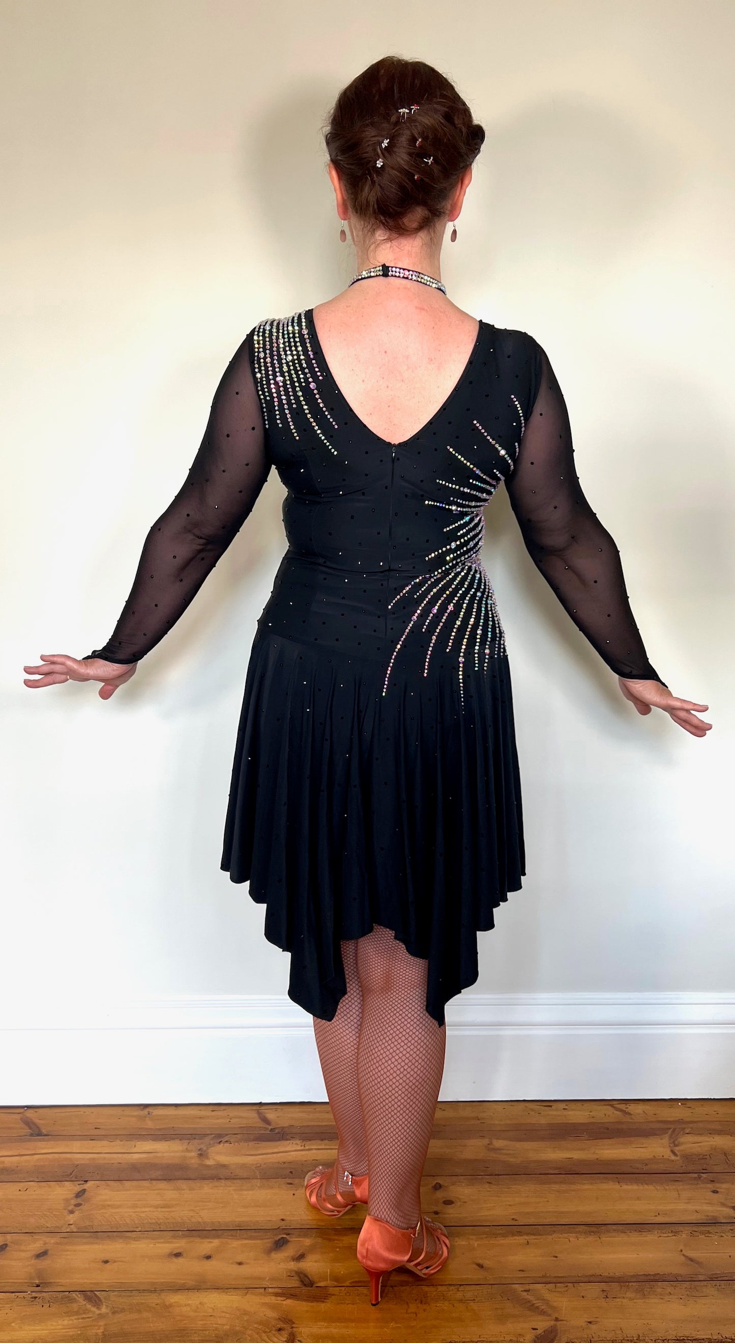 199 Flattering Black Latin Dance Dress. Super Stretchy. Stoned in AB starburst design with handkerchief hem skirt. High back giving option for wearing own bra.