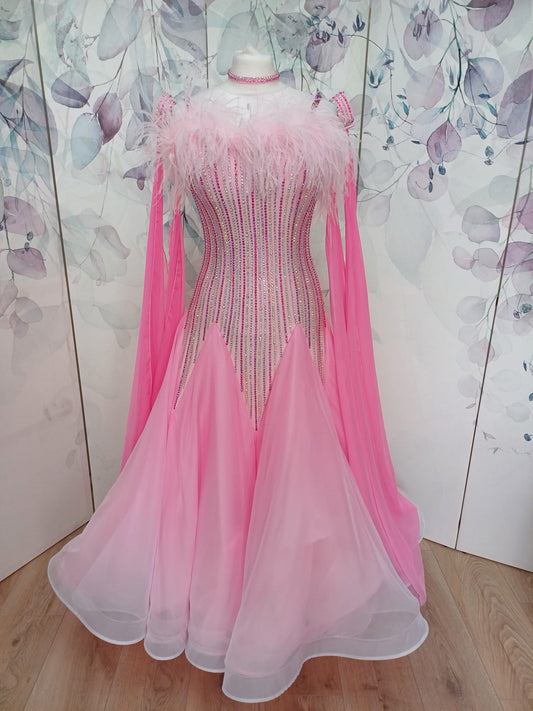 016 Pink & White Ombre Ballroom Dress with Ostrich feather to the upper chest area. Stoned in Light Tose, Rose, Rose AB & AB. Detachable floats