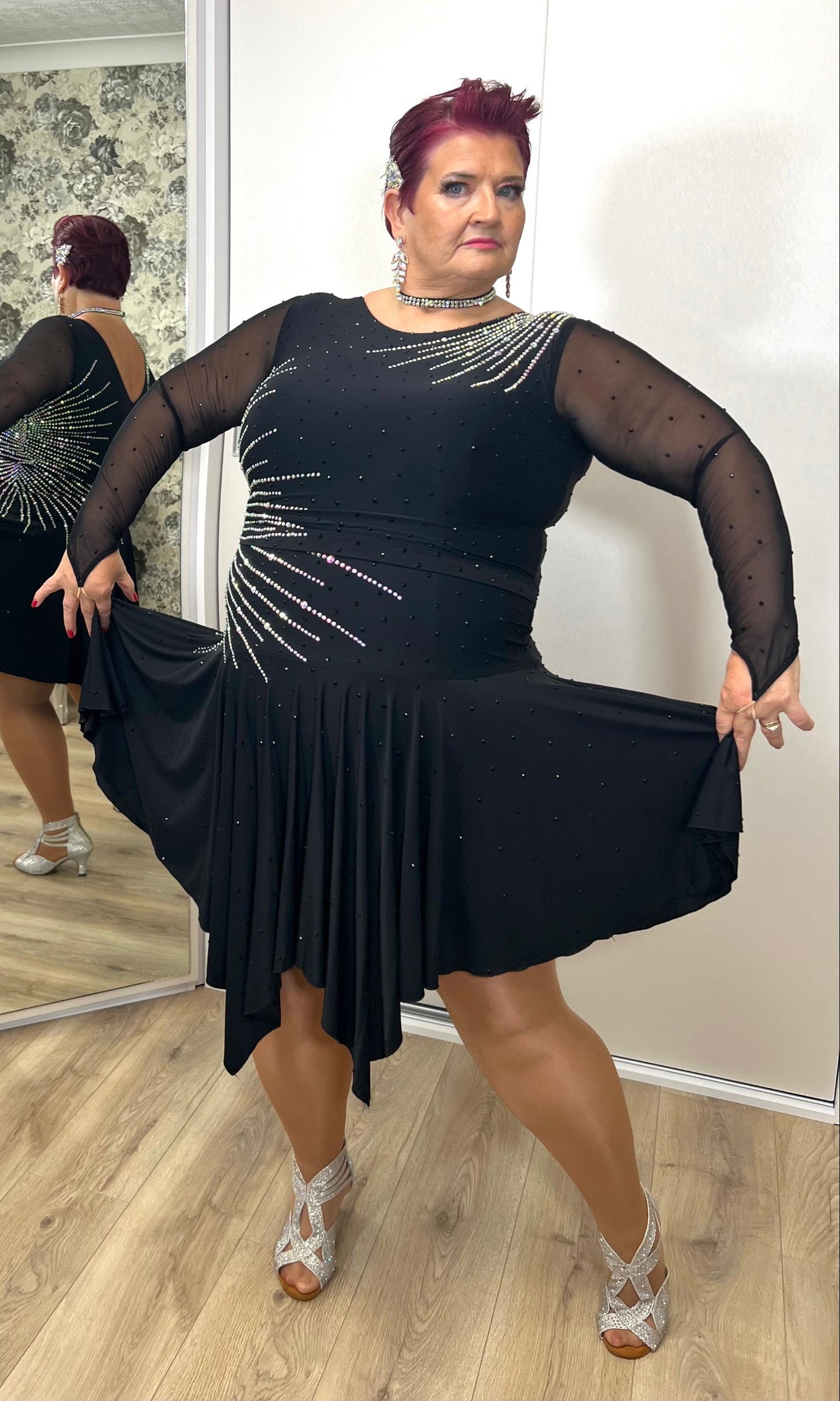 199 Flattering Black Latin Dance Dress. Super Stretchy. Stoned in AB starburst design with handkerchief hem skirt. High back giving option for wearing own bra.