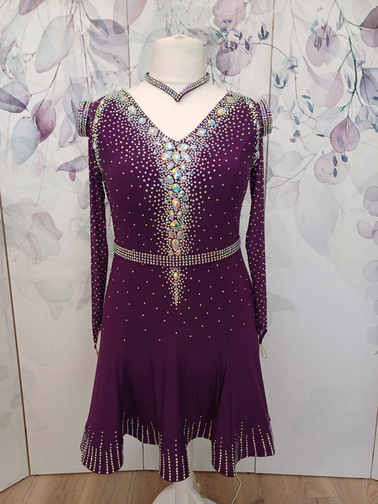 307 Plum Competition Latin Dance Dress. Dress comes with optional belt. Stunning AB stoning to the front, back & hemline. Small Split to the left of the skirt.