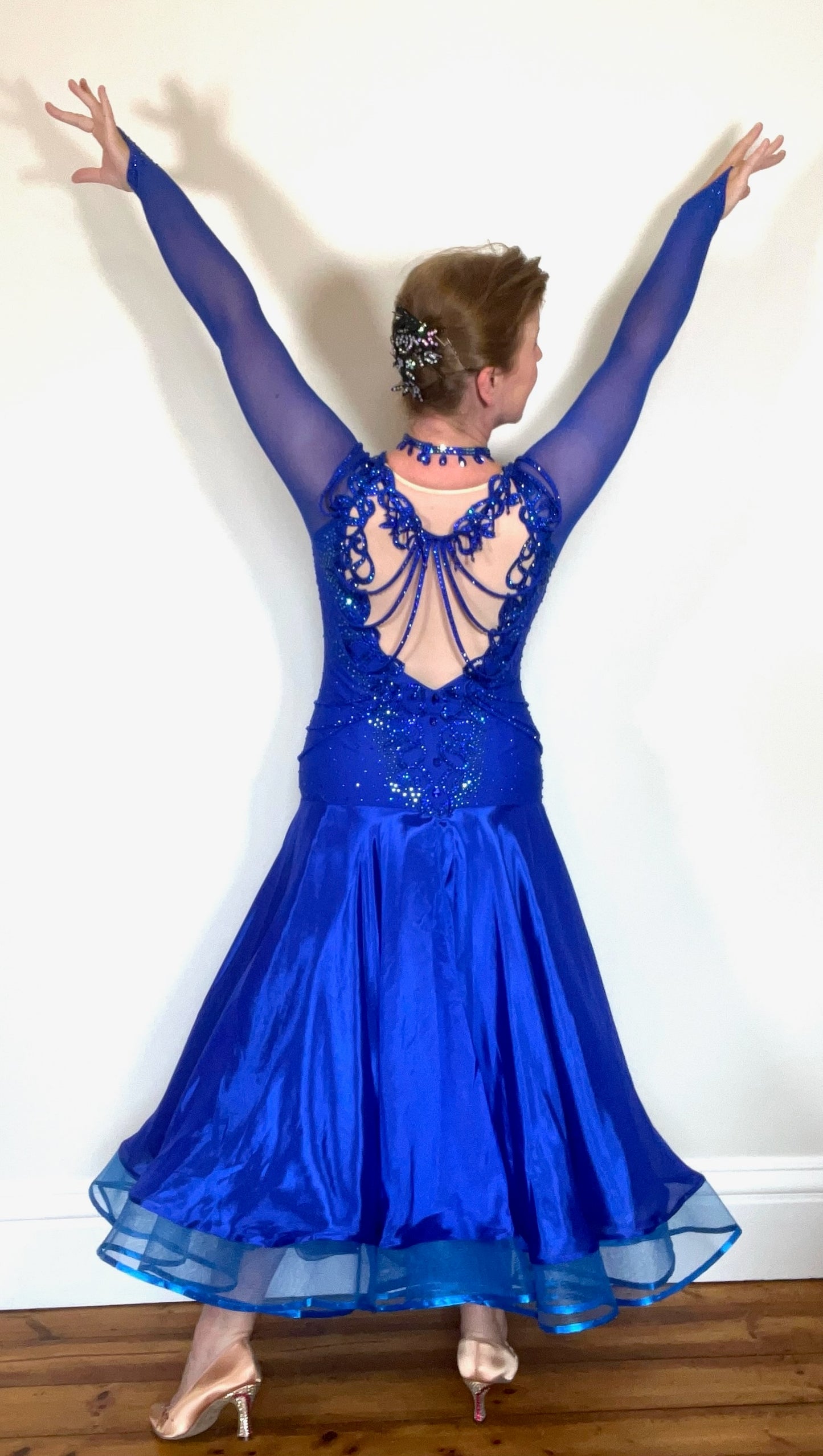 339 Bright Royal Blue Ballroom Dress. Stunning detailing to the back with Strappy detail to the hips. Organza edged in ribbon. All stoned in Bright Royal Blue. Very comfortable Front Zip fastening.