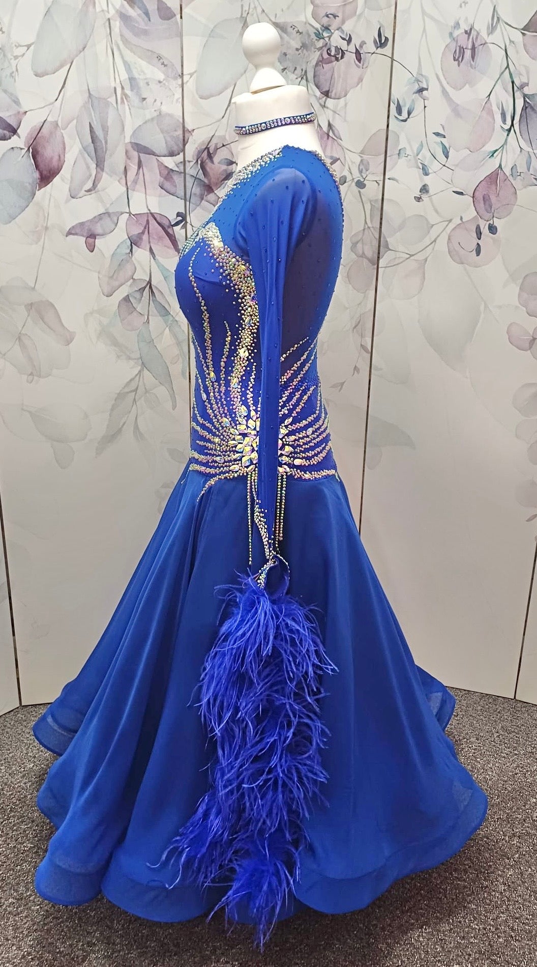 098 Royal Blue Competition Dance Dress. Heavily stoned with AB & Sapphire. Hanging strip details to upper right chest. High back giving option to wear own bra.