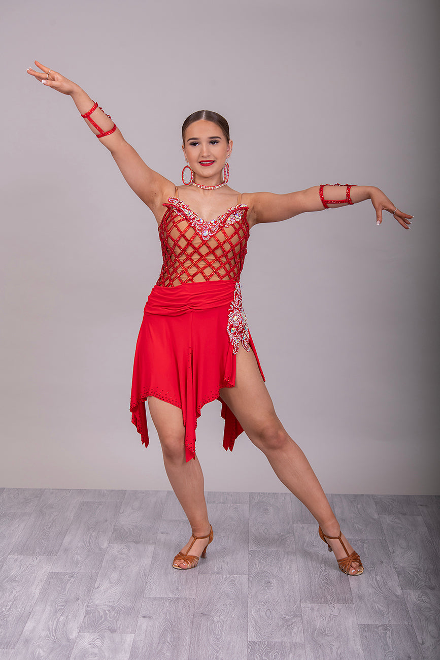 13L Red Fishnet & Flesh Competition Latin/Rhythm Dress. Heavily stoned in Light Siam & AB with decorative side panel.