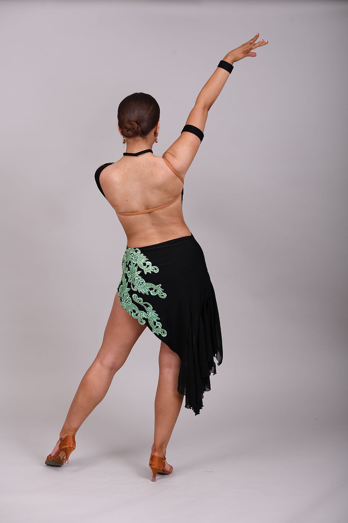 100 Black mesh on Lycra with green motifs and mesh godets Latin dress. Olivine stoned motifs.