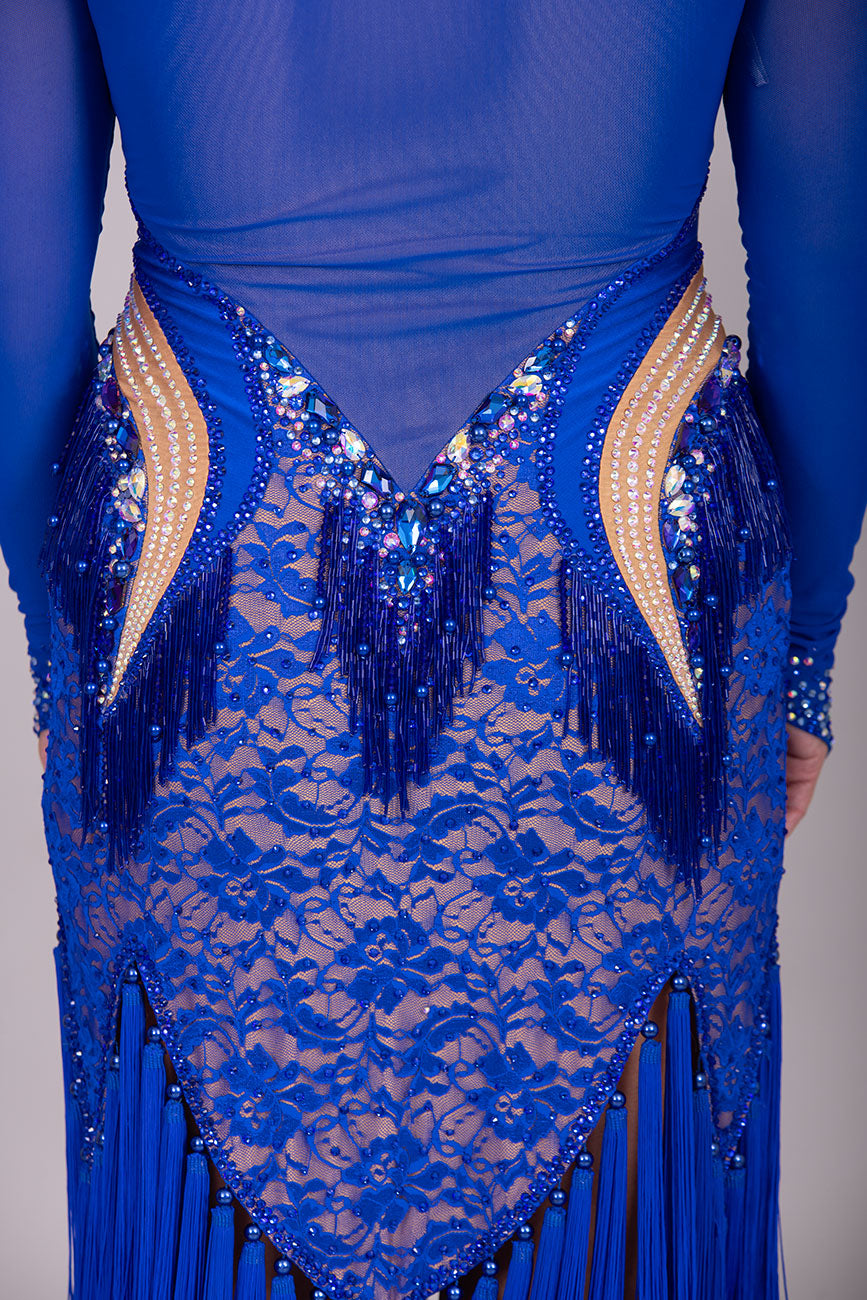 128L TWD “ELITE” Stunning Royal Blue Competition Latin Dance Dress. Striking stone detail with lace over mesh Lycra. Front Zip fastening for ease. High back mesh on Lycra giving option of wearing own bra. ❤️Showroom Appointments Available❤️