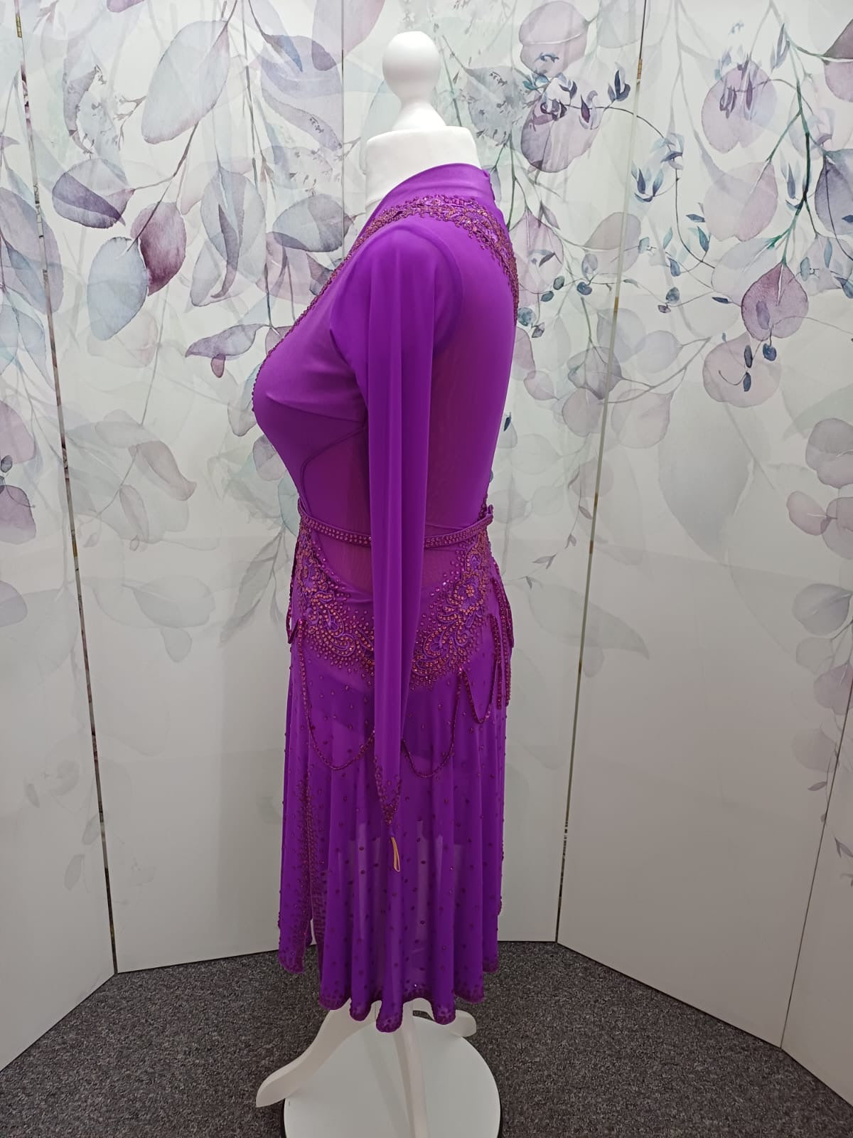 59L Hot Magenta Competition Latin Dance Dress.small split to front left. Very full skirt for maximum movement. High back to allow own bra option. Stunning stoned appliqués Strappy design waist/hip. Stoned in Fuschia & light Rose ❤️Showroom Appointments❤️