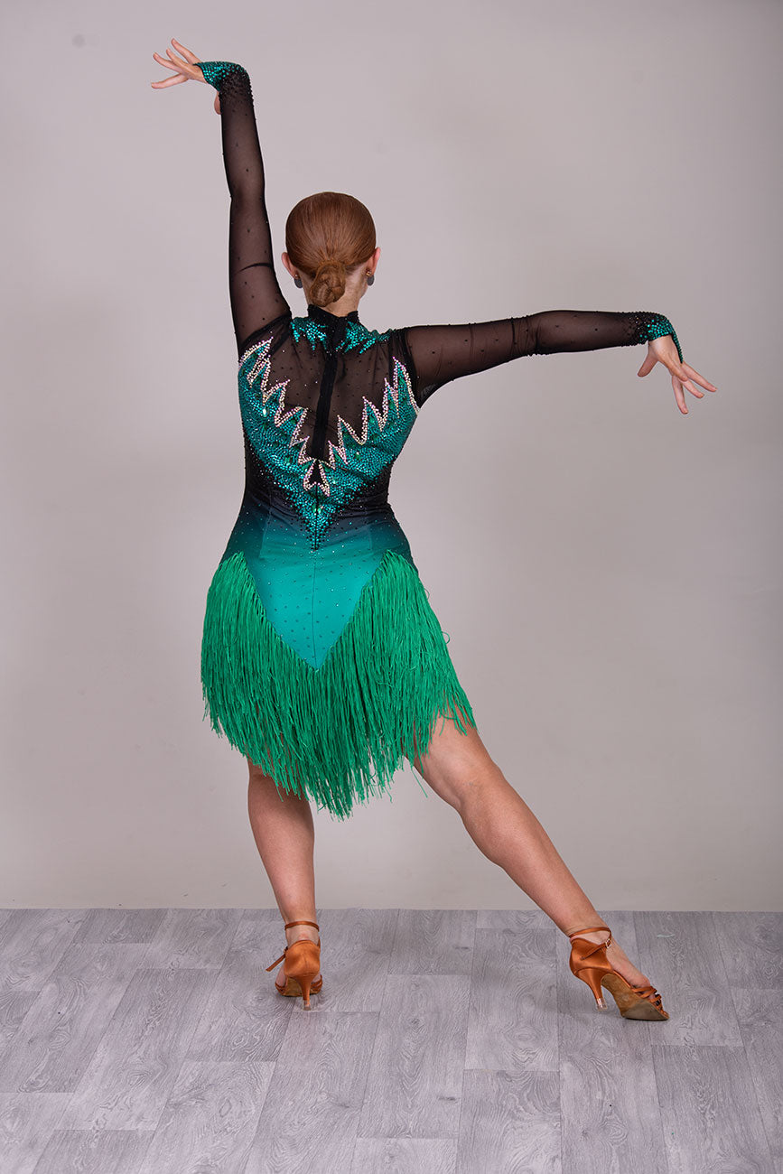118L TWD ELITE LATIN Competition Latin Dance Dress. Striking Design to front & Back with Ombre Green & Black Lycra Bodice. Full fringed skirts for maximum movement.