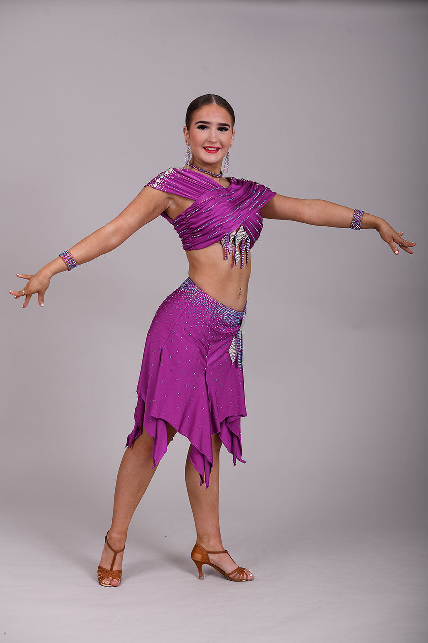 186 Stunning Latin 2 Piece. Full handkerchief skirt. Skirt comes with a choice of 2 tops. Stoned in Fuchsia AB & Fuchsia. Please add note at checkout choice of top required.