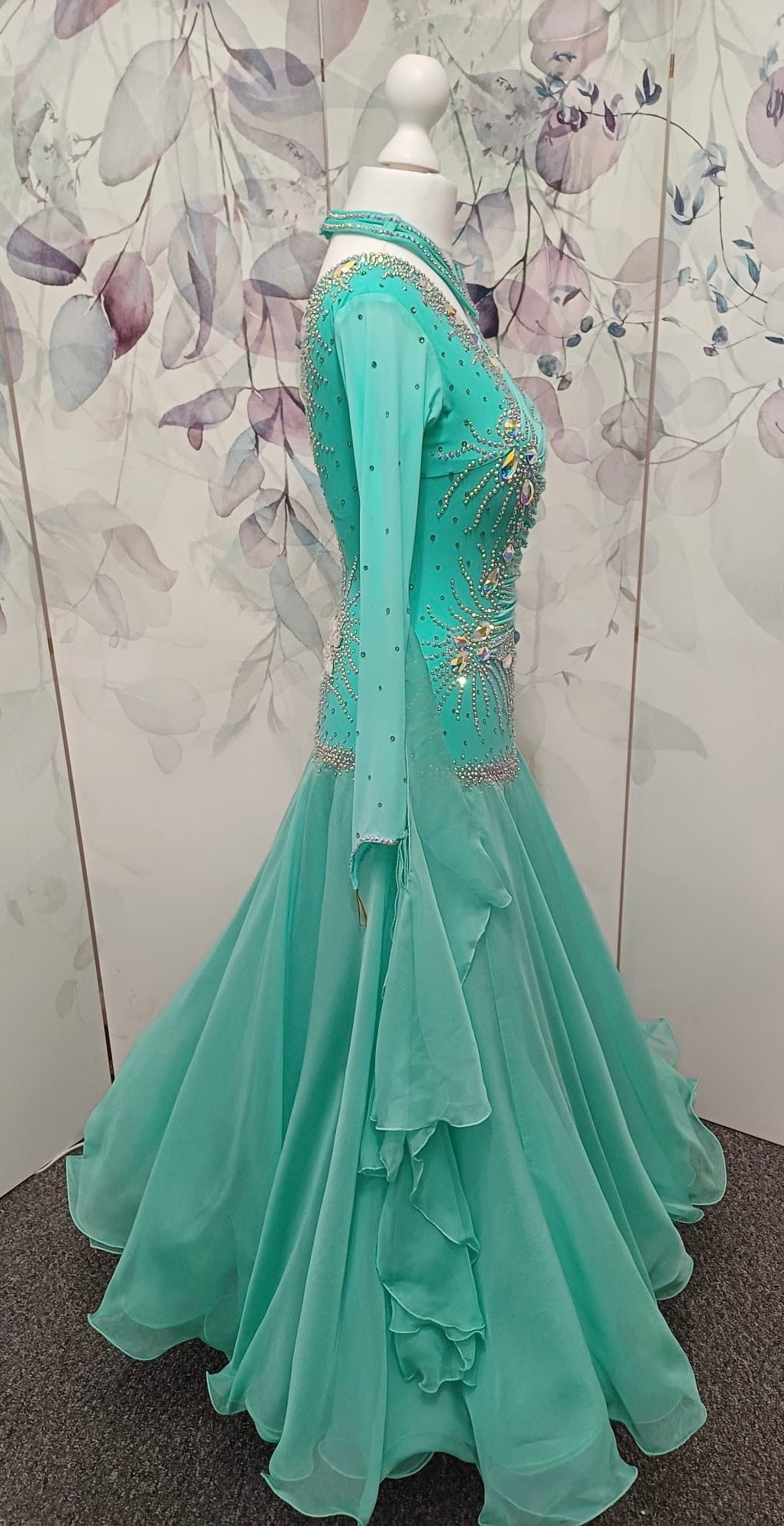 051. Stunning Mint Green Competition Ballroom Dance Dress. Heavily stoned in AB with Mesh detailing to the front. Detachable floats