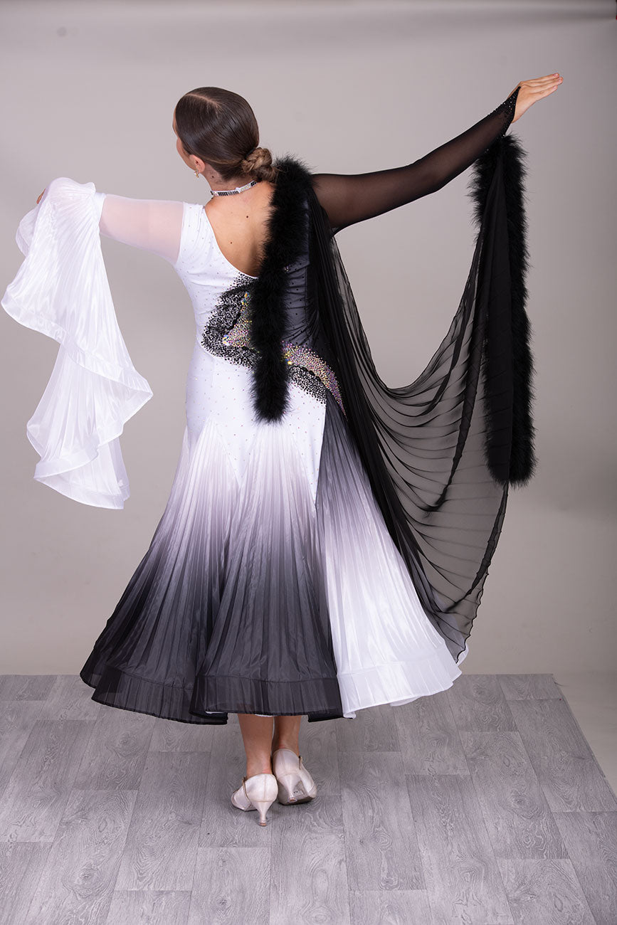33B  “TWD ELITE” Ballroom/Sequence Competition Dance Dress
High Back allowing option to wear own Bra. Pleated Skirts in Black & White Ombre Pearl Chiffon. Pleated bell sleeve to 1 arm. Finger loop can be added. 

❤️Showroom Appointment Available❤️
