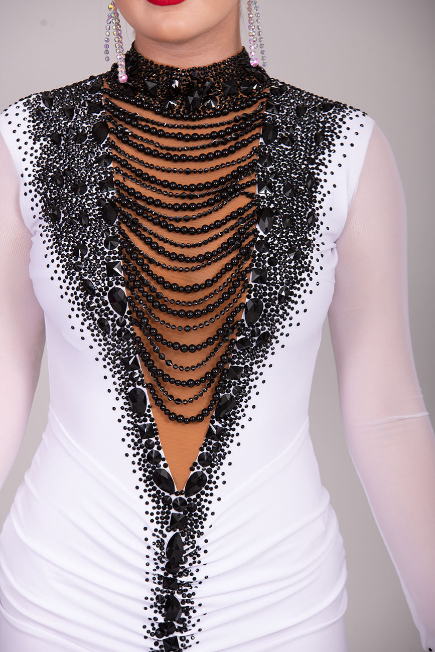 08L Stand Out Striking Competition Latin Dance Dress. Stunning Bodice detailing in Tan & Black. Deep collar with beading to the front. Ruched front with longer back.