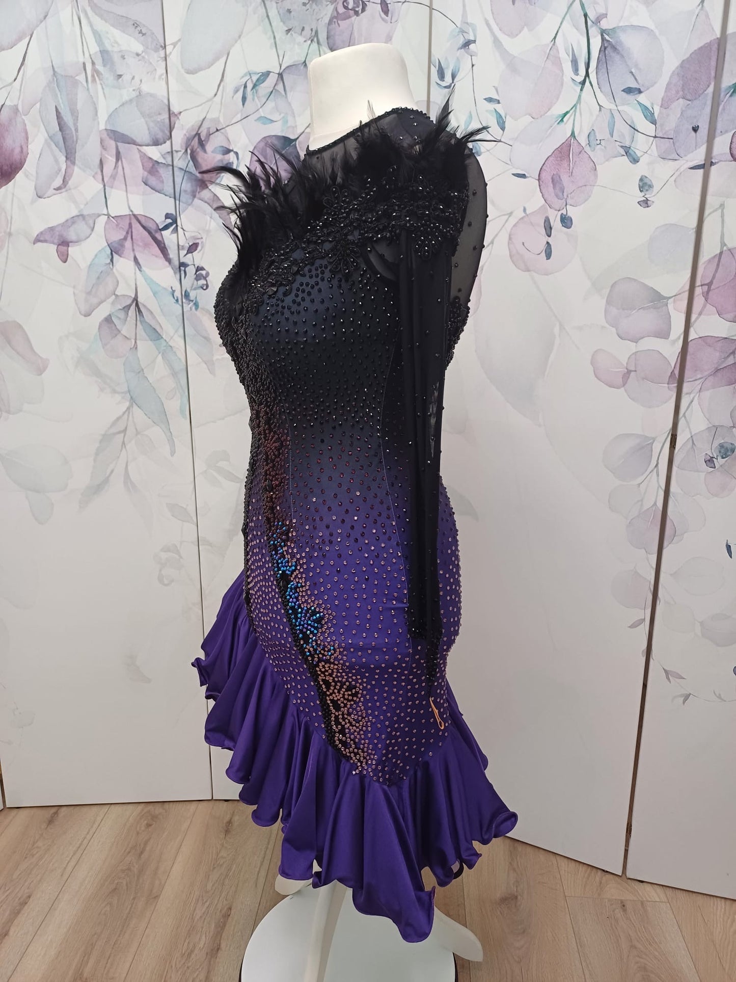 194 Standout Latin Dance Dress. Black to purple ombre with full frill skirt. Decorated with ostrich feather trim, purple & jet stones.